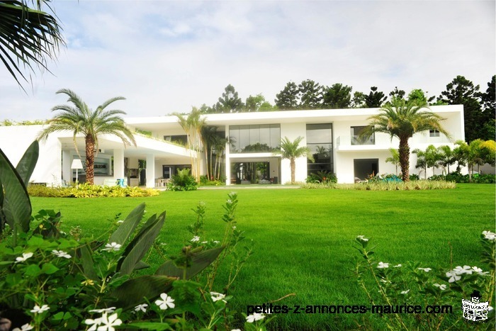 SUBLIME GRANDE VILLA CONTEMPORAINE HAUT DE GAMME A FÔRET DARUTY PETIT RAFFRAY