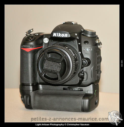 Vends NIKON D7000 (1 an) + 18-55mm + Grip + Pied Tripod + Soft View NX